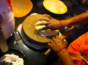 Deepa making Chapatis